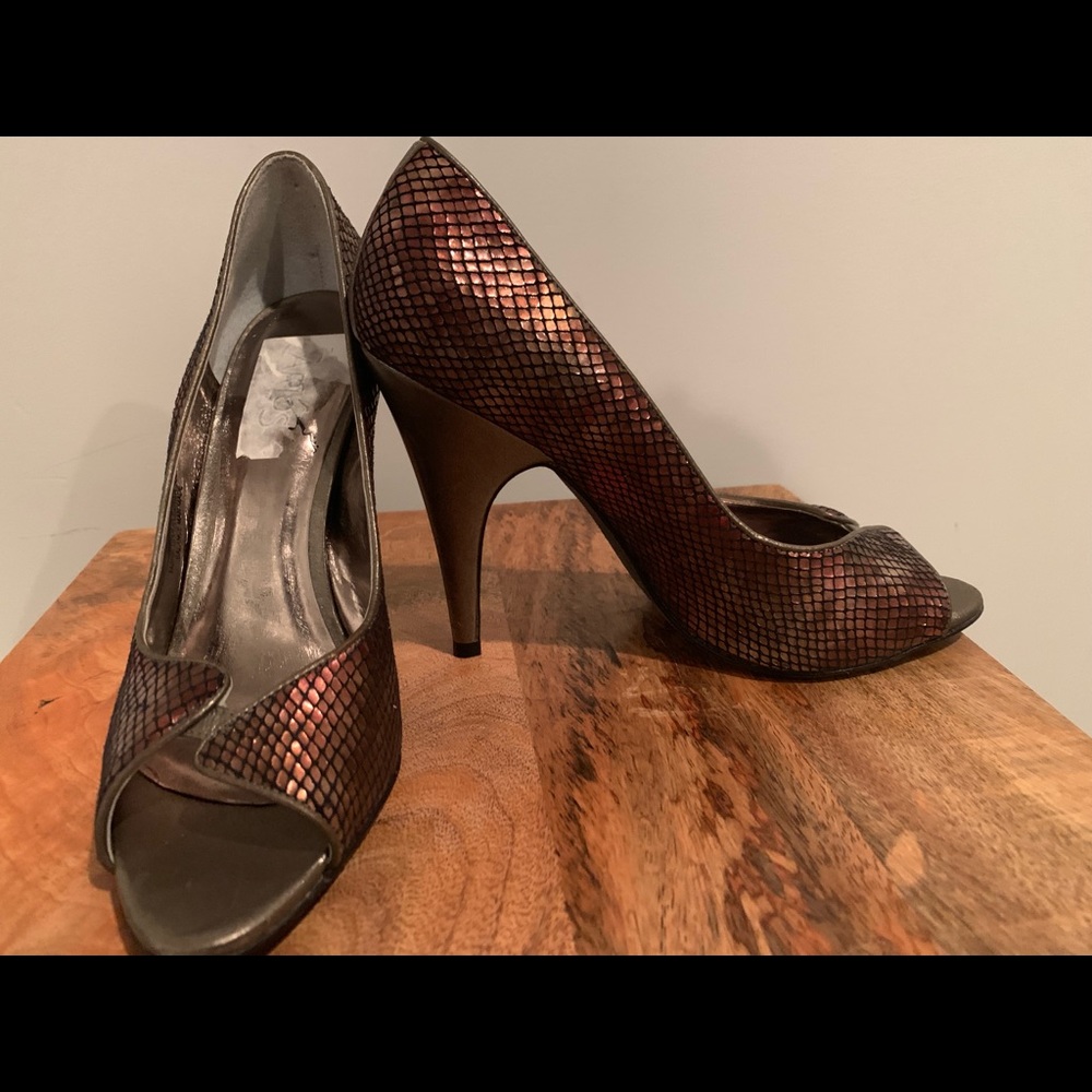 Maroon colored snake-skin like heels
